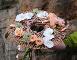 Bouquet in a modern bouquet holder with roses and phalaenopsis