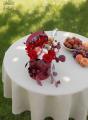 Fruit wine among red roses in cylinder box (8 stems) - original product photo with AI background