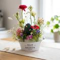Osterblumenschale mit Emu-Ei und Frühlingsblumen - original product photo with AI background