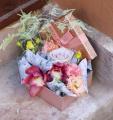 Small sparkly flower box with rose, orchids