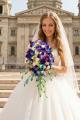 drop shape bridal bouquet (dendrobium, ranunculus, blue, white) - original product photo with AI background