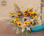 Modern bouquet with sunflowers and dried grasses