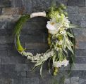 Modern hoop bouquet with one-sided decoration (ornithogalum, delphinium, alstroemeria, calla, white)