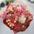 Big peach - red flower bouquet with cloud of small flowers