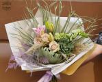 Natural bouquet with furry echeveria, roses, lilies