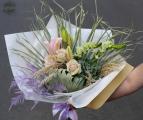 Natural bouquet with furry echeveria, roses, lilies