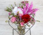 Heart shaped metal vase with rose, orchid, small flowers