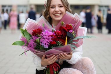 flower delivery Budapest - Red rose and orchids graduation bouquet for girls - original product photo with AI background