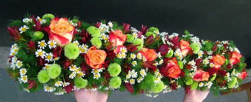 long centerpiece with orange roses (80cm)