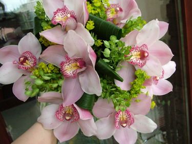 round bouquet of 10 light pink orchids