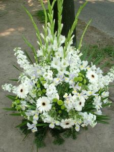 big standing church arrangement with gladioluses, stocks, gerberas and irises (1.5 m)