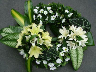 ivory wreath covered with flowers (70cm)