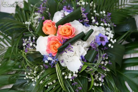 car flower arrangement with roses, hydrangeas, statice, baby's breathe, sesonal flowersm orange, white, blue, purple)