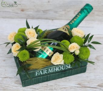 Crate with champagne and spray roses