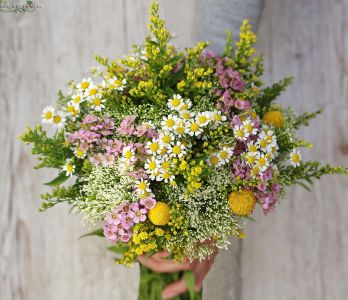 Bridal bouquet with wild flowers (chamimile, solidago, craspedia, waxflower, yellow, pink)