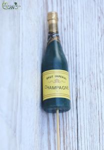 Champagne figure on stick 