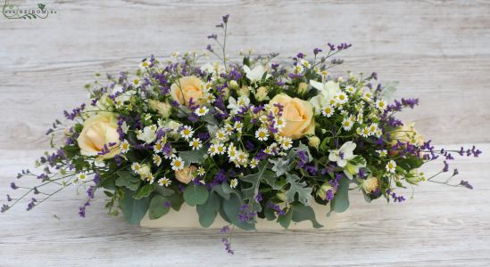 Centerpiece in wooden bow (rose, limonium, peach, purple)