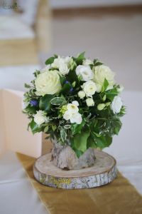 Centerpieces in wooden logs, (lisianthus, rose, gentiana, blue, white ) Szendehely, Szepi Restaurant