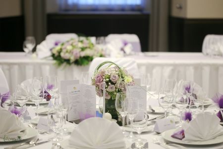 Centerpiece in glass sphere, Hilton Budapest (spray roses, babybreath, cala, purple, white)