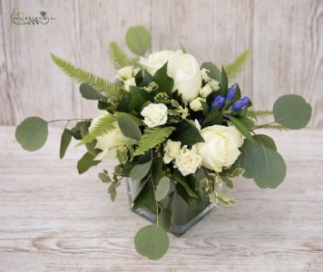 Wedding table decoration in glass cube (rose, spray rose, gentian, eucalyptus, fern, white, blue) 