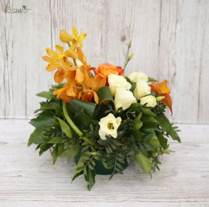 Wedding table decoration (mokara orchid, lisianthus, orange, cream)