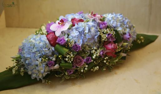 Main table centerpiece (hydrangea, rose, lisianthus, phalaenopsis orchid, blue, purple)