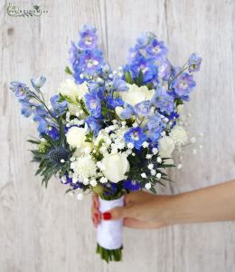 Light summer bouquet with roses, delphinuum and babybreath