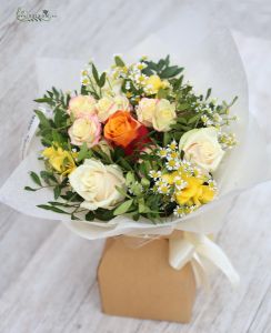 Round bouquet with roses in paper vase
