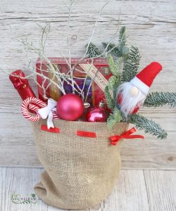 Weihnachtsmann-Paket mit Weihnachtszucker und Champagner