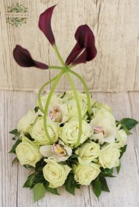 Centerpiece with callas, orchids and roses