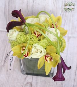 Modern glass cube with calla lilies, orchids and roses (18 stems)