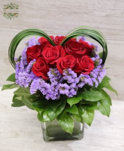 10 red roses with small flowers and leaf heart