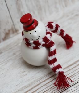 Ceramic snowman with knitted scarf