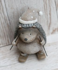 Skiing hedgehog ceramic figure