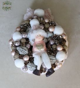 Powder-colored wreath with a little girl