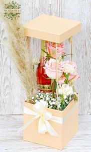Peach flowerbox with roses, carnations, pampass grass, champagne