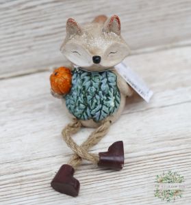 ceramic fox with hanging legs in a leaf vest (20cm)