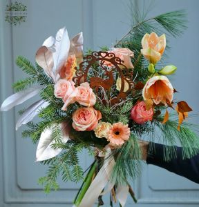 winter peach bouquet with amaryllis and deer