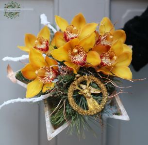 Sternschale mit gelber Orchidee und Rentierfigur