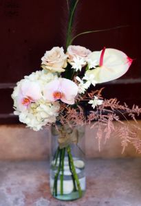 Airy bouquet with flamingo flower, orchids, with cylinder vase