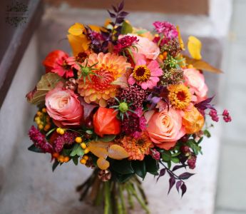 Autumn bridal bouquet with dahlias (rose, dahlia, zinnia, scabiosa, skimmia, orange, burgundy)