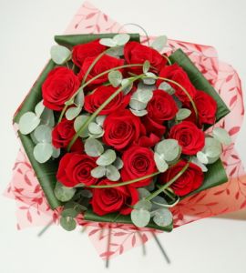 15 red roses with exclusive greenery