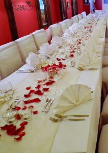 floating candles with red pettals, wedding