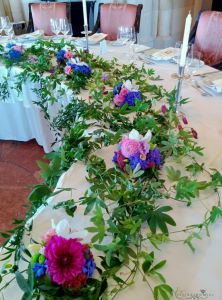 Main table centerpiece (passion flower, hydrangea, lisianthus, dahlia, purple, blue, pink), Fisherman's Bastion Restaurant, wedding