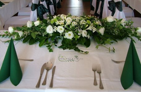 Main table centerpiece (white freesia, santini, alstromeria, lisianthus, baby's breath, pompom), wedding