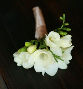 Boutonniere of freesias (white)