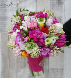 Bridal bouquet with colorful spring flowers (frézia, hyacinth, bouquet, tulip, pink, orange, white)