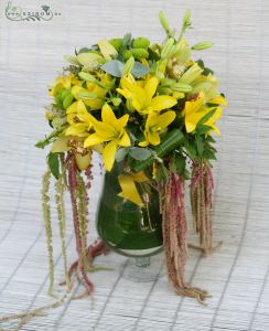 Centerpiece with yellow lilies, wedding
