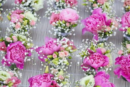 centerpieces in cups with peonyes, wedding