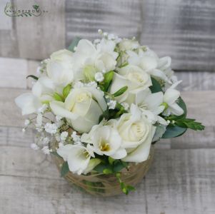 Centerpiece glass cube with white roses and freesias, wedding